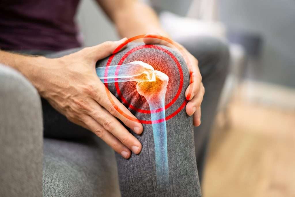 man with knee and joint pain 82110738 YI Knee joint pain and arthritis inflammation causing chronic discomfort and reduced mobility.